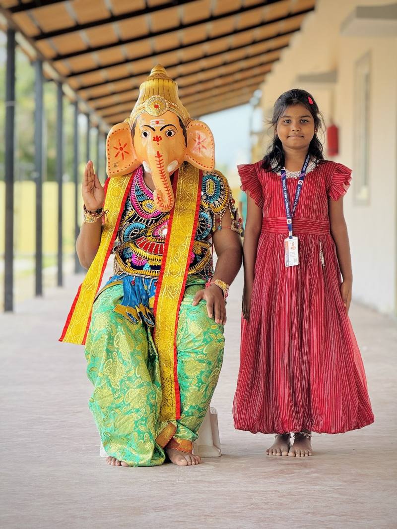 Ganesh Chaturthi Girl Red Sadhguru